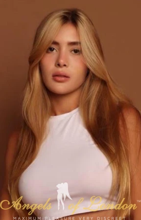 Blonde escort Flippy in white
