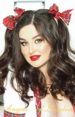 Busty escort Monique in red lipstick