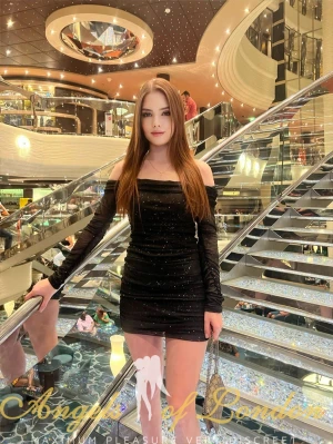 Slim Young Escort Otima in short black dress