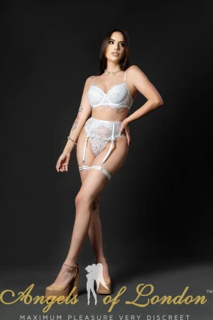London escort Valdirene in white lingerie