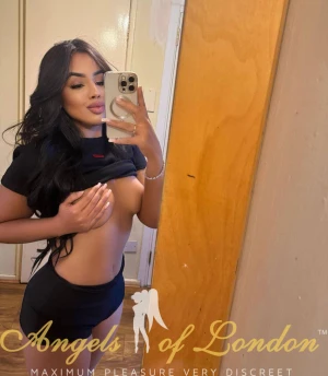 London escort Rexova topless