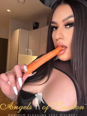 Brazilian escort Zolten selfie with carrot