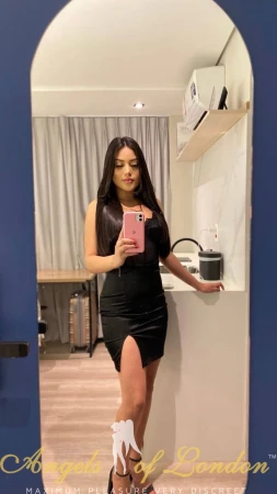 Brazilian escort Manola selfie in black dress