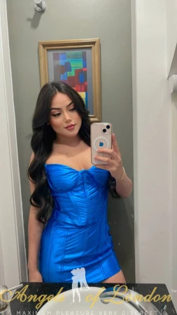 Brazilian escort Manola selfie in blue dress
