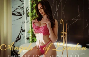 London escort Leila in pink lingerie