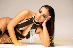 London escort Raela on the floor