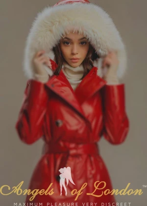 London escort Fidela in red coat