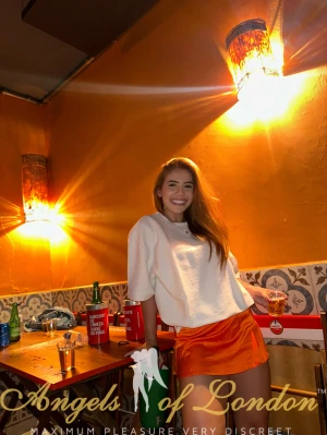 London escort Makani in white shirt
