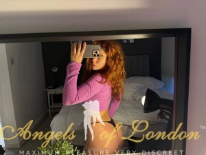 London escort Makani mirror selfie