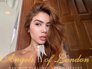 London escort Makani showing off hair