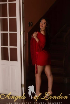 London escort Triga in red dress