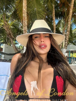 London escort Spark in hat
