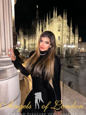 London escort Spark in black dress