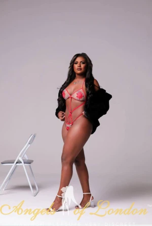 London escort Verla in red