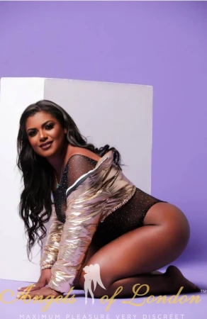 London escort Verla bending over