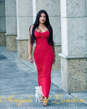 London escort Lavella in red dress