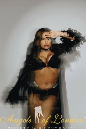 London escort Morela in black bra