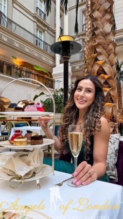 London escort Vitka selfie afternoon tea