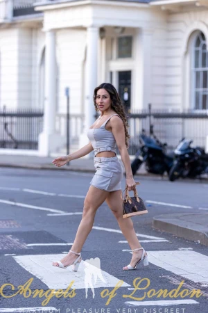 London escort Vitka crossing the street