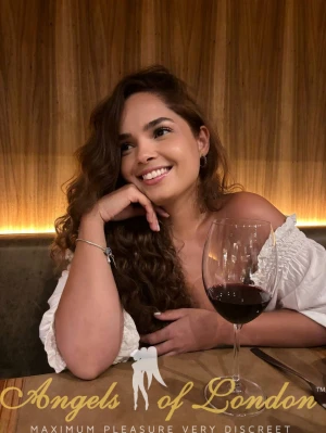 London escort Malati smiling