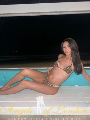 Natural escort Maguana by the pool