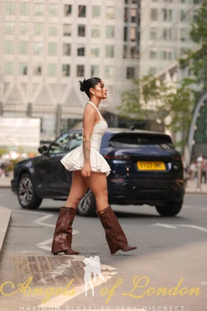 London escort Gella crossing the road