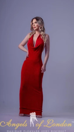 London escort Mirelly in red dress