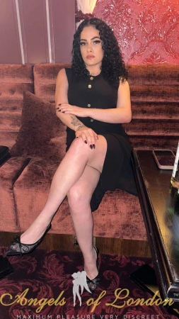 Londno escort Sharma in black dress