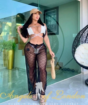London escort Vermonta in white bikini