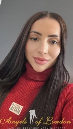London escort Vermonta in red top