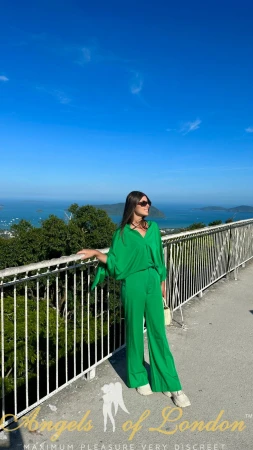 London escort Fallyn in green outdoors
