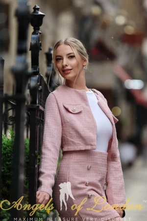 London escort Nona in stylish clothes