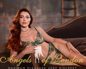 London escort Buna in green lingerie
