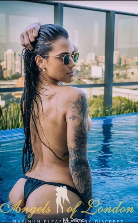 London escort Sharlee in the pool