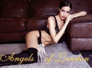 London escort Albertine in black knee boots