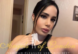 London escort Albertine selfie in black dress