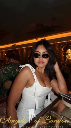 London escort Tissa in sunglasses