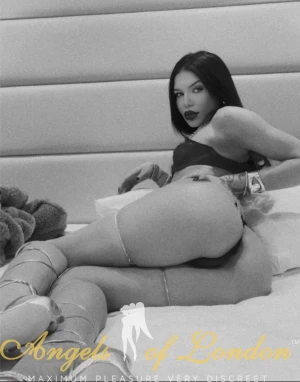 London escort Varena in black and white