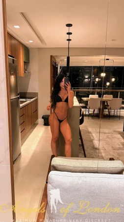 London escort Manori in bikini