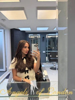 London escort Denella mirror selfie