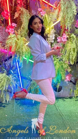 London escort Croatia in pink heels