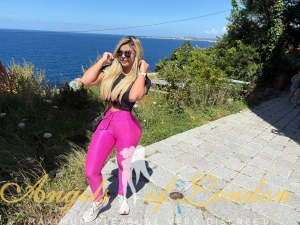 London Escort Kalina in pink leggings
