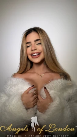 London escort Elvin smiling