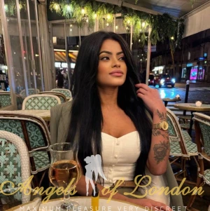 London escort Irida at restaurant
