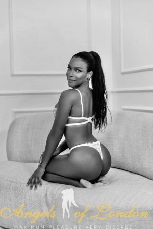 London escort Noomi in black and white