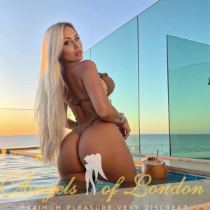 London escort Ganymede outside in bikini