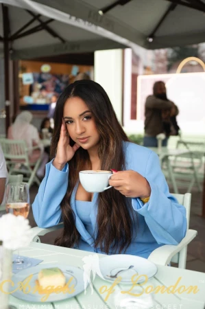 London escort Kuraga having coffeee