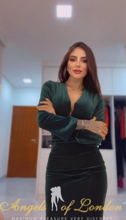 Brazilian escort Freesia in green dress