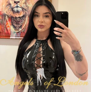 London escort Zambia in her BDSM outfit