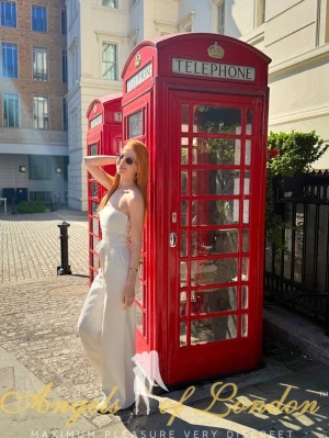 London escort Dionce with phonebox
